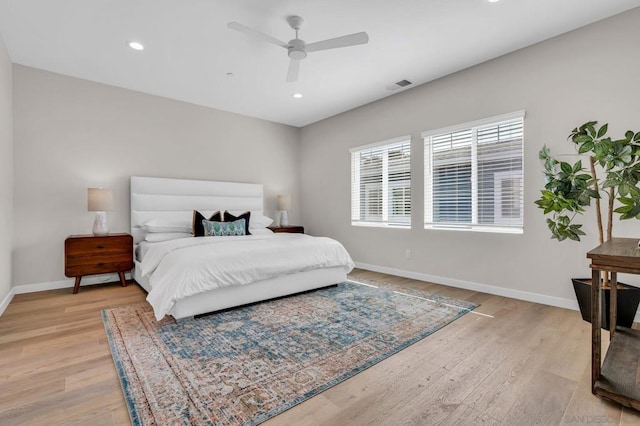 bedroom featuring ceiling fan and light wood-type flooring