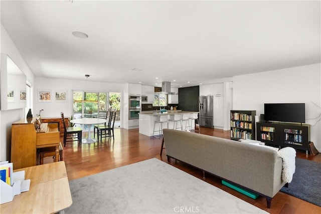 living room with dark wood-type flooring