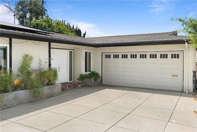 exterior space with a garage