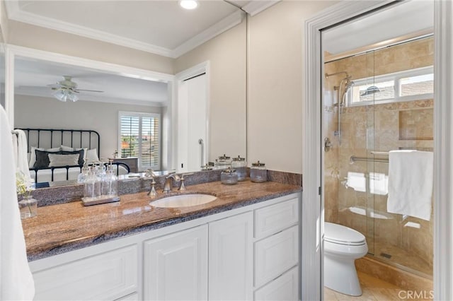 bathroom featuring ceiling fan, ornamental molding, an enclosed shower, and toilet