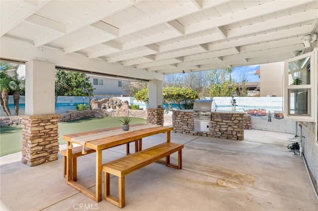 view of patio / terrace with exterior kitchen and grilling area