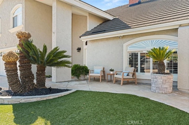 exterior space with a yard and a patio area