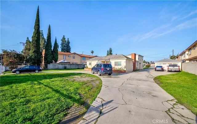 ranch-style home with a front yard