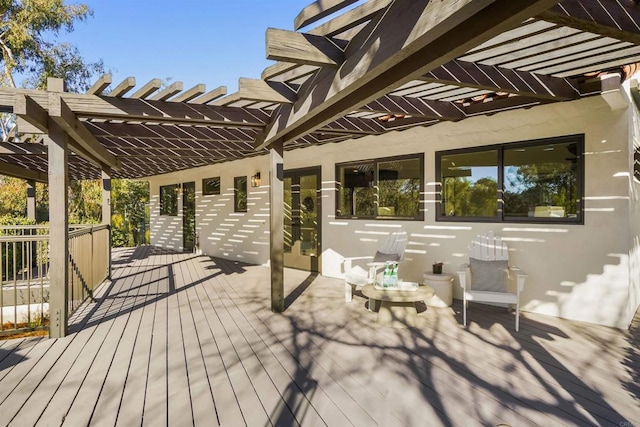 wooden terrace with a pergola