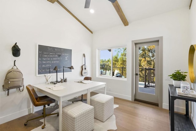 office area featuring ceiling fan, light hardwood / wood-style flooring, and beamed ceiling