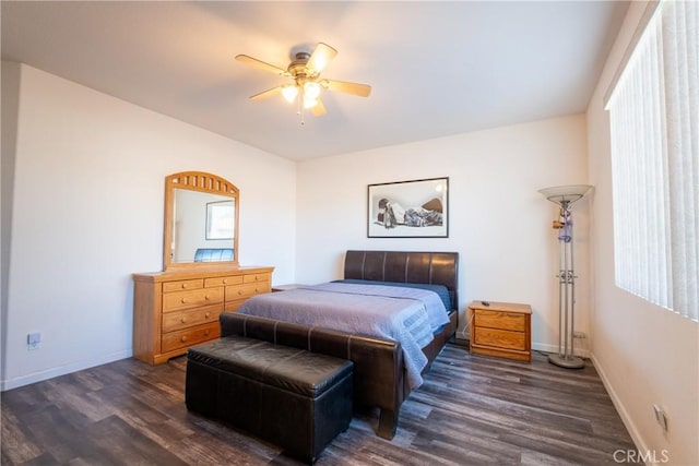 bedroom featuring ceiling fan and dark hardwood / wood-style flooring