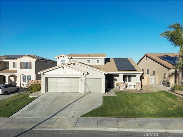 view of front of house with a front lawn, solar panels, and a garage