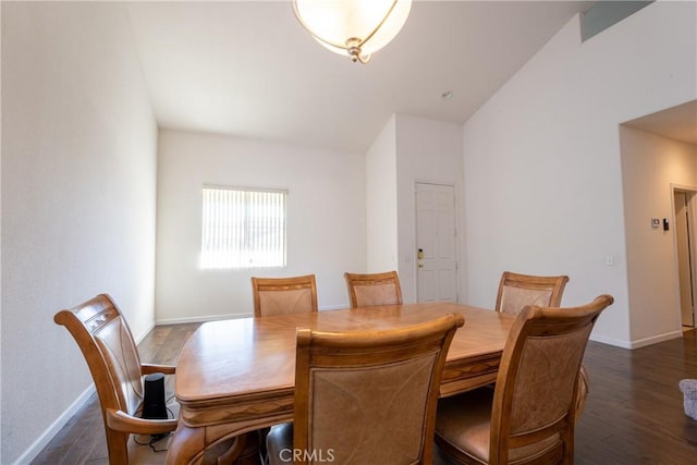 dining space with dark wood-type flooring