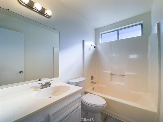 full bathroom with toilet, vanity, and bathtub / shower combination