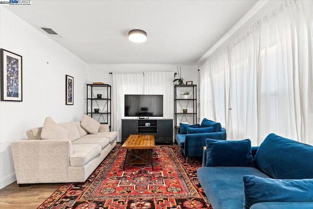 living room with hardwood / wood-style flooring