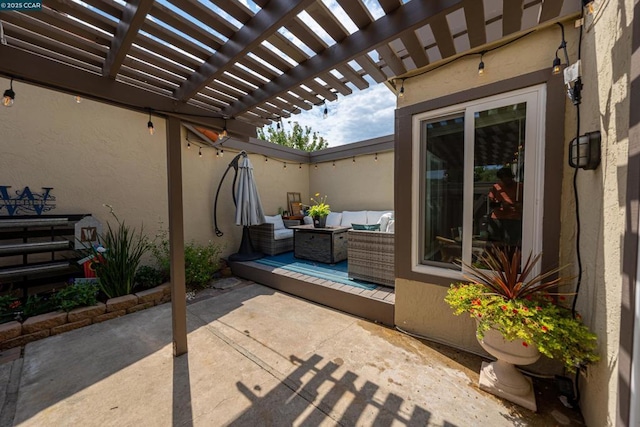 view of patio / terrace featuring a pergola and an outdoor living space