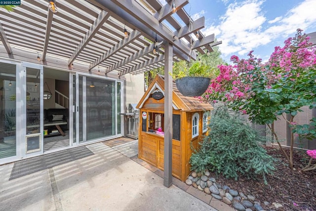 view of patio / terrace featuring a pergola