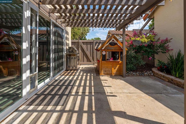 view of patio / terrace featuring a pergola