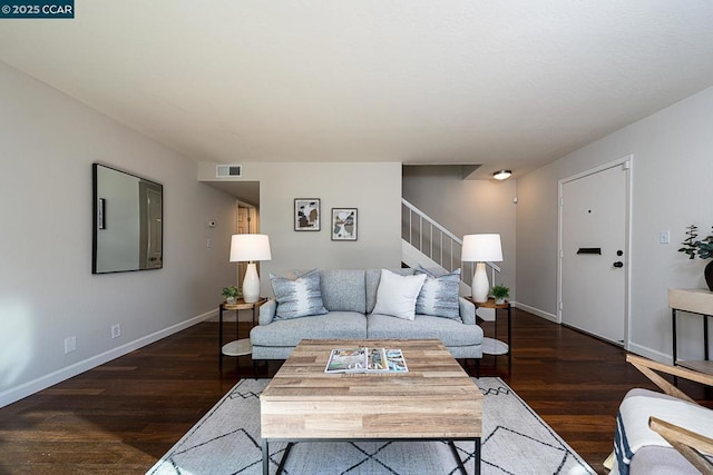 living room with dark wood-type flooring