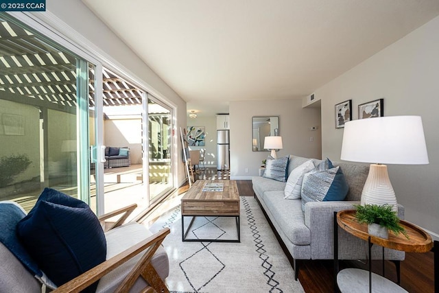 living room with hardwood / wood-style floors