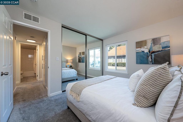 carpeted bedroom featuring a closet