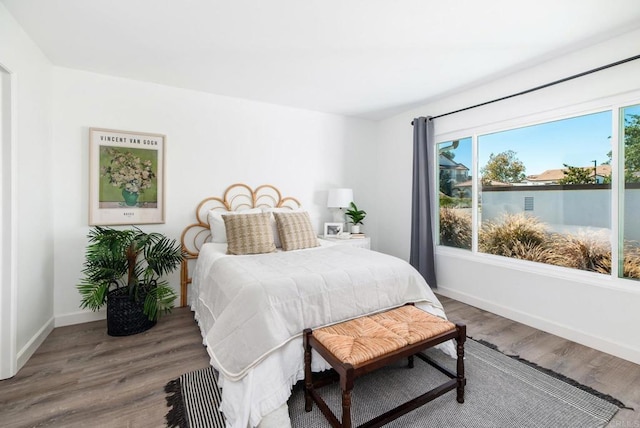 bedroom featuring hardwood / wood-style floors