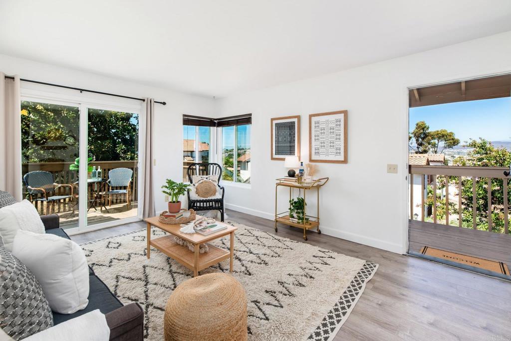 living room with light hardwood / wood-style flooring