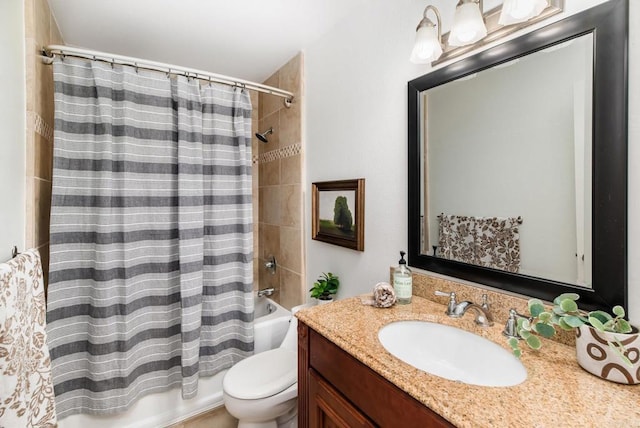 full bathroom with toilet, vanity, and shower / bath combo