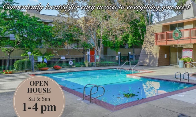 view of swimming pool with a patio