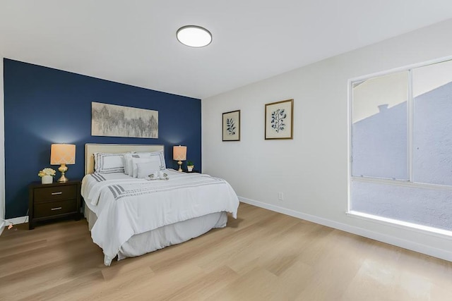 bedroom featuring wood-type flooring