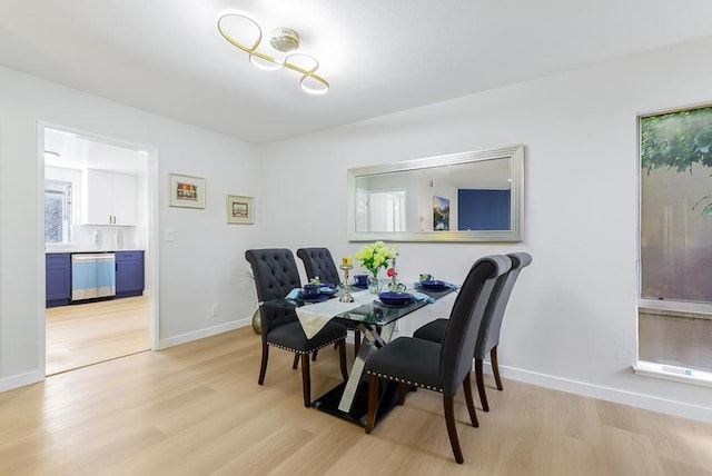 dining space featuring light hardwood / wood-style flooring