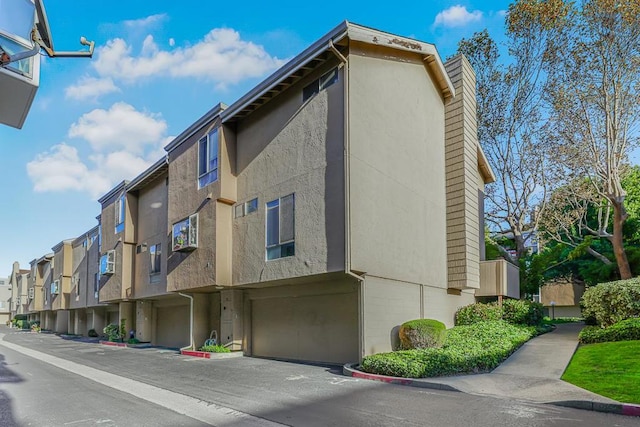 view of building exterior with a garage