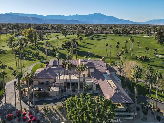 bird's eye view featuring a mountain view and golf course view