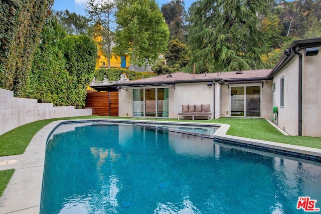 view of swimming pool with an outdoor hangout area