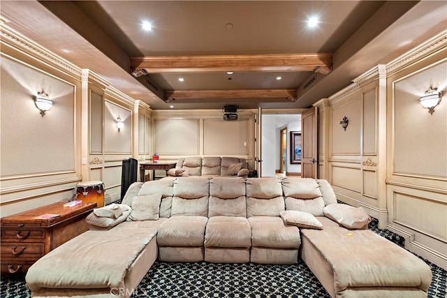 home theater featuring beamed ceiling