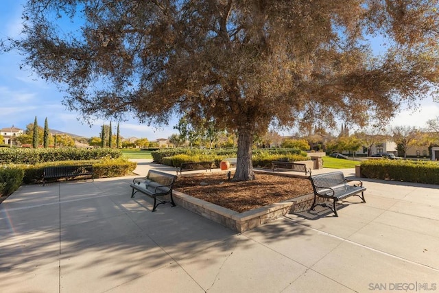 view of property's community with a patio area