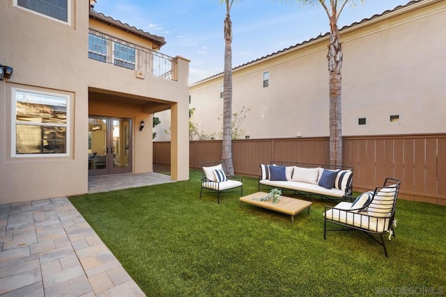 view of yard with outdoor lounge area and a patio