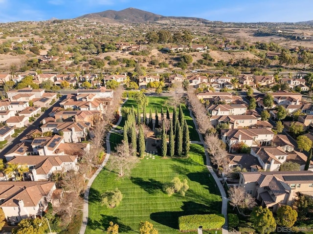 birds eye view of property featuring a mountain view