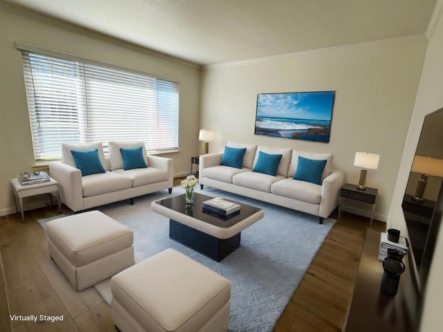 living room with ornamental molding, plenty of natural light, and hardwood / wood-style flooring