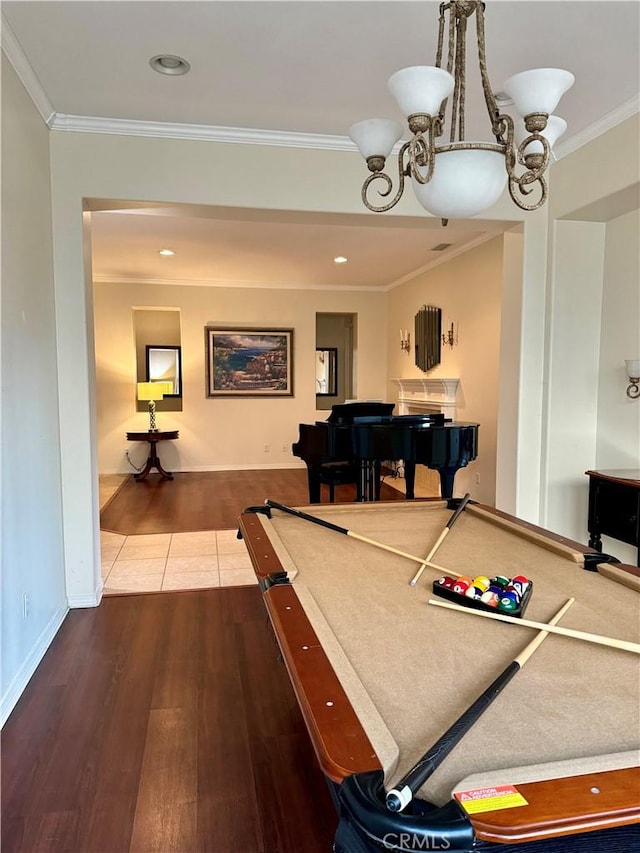 rec room with hardwood / wood-style flooring, crown molding, and billiards