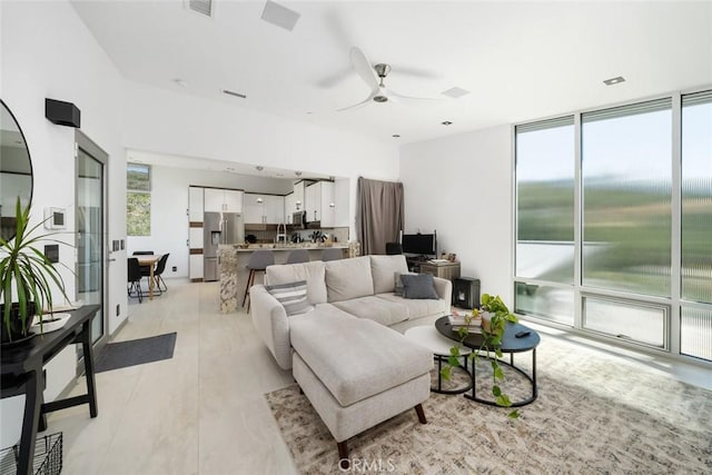 living room featuring ceiling fan