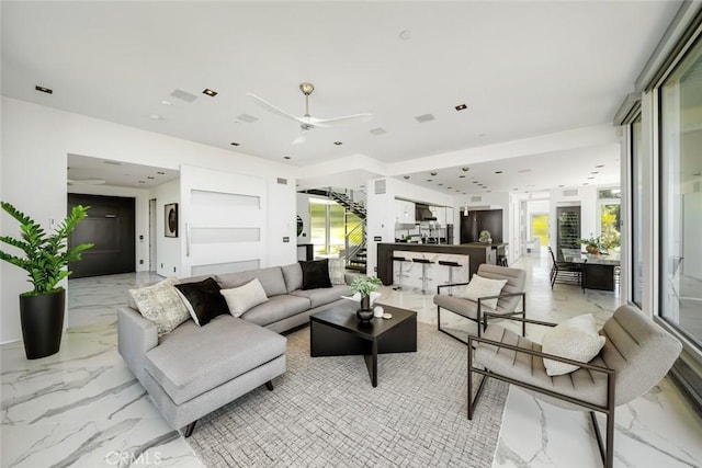 living room with ceiling fan