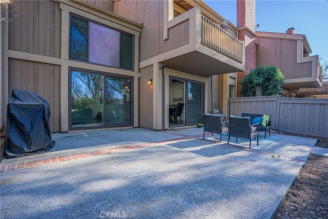 view of patio with a balcony