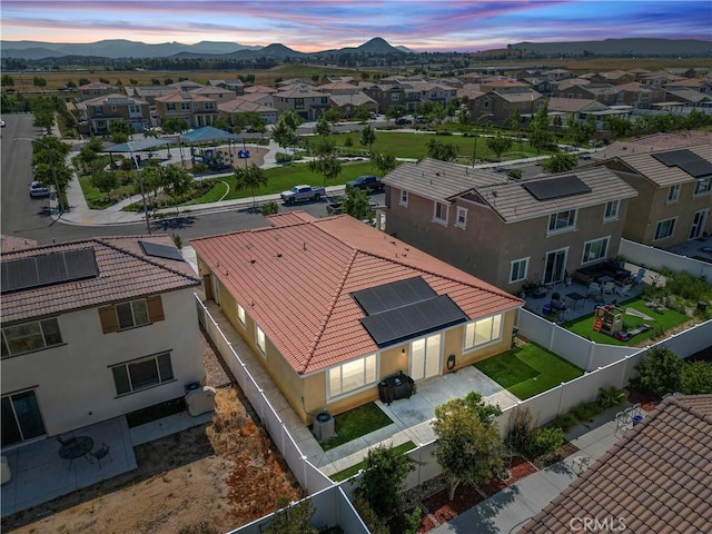 aerial view at dusk with a mountain view