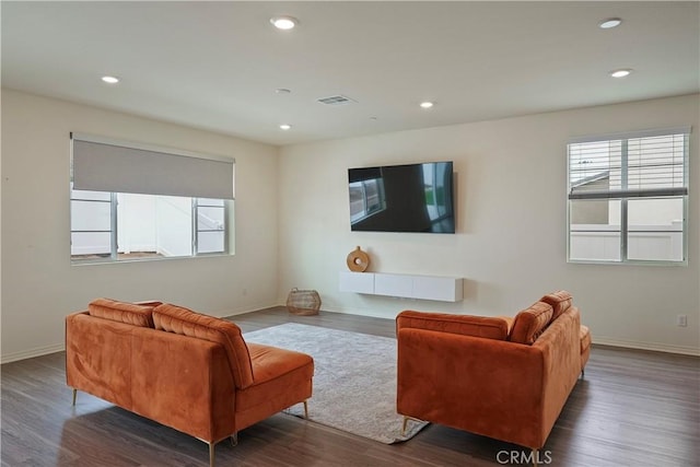 living room featuring dark hardwood / wood-style floors