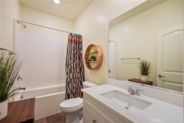 full bathroom featuring toilet, shower / tub combo, vanity, and tile patterned floors