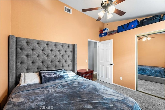 bedroom with a closet, ceiling fan, and carpet floors