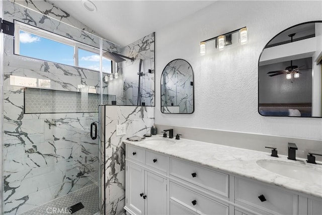 bathroom with an enclosed shower, lofted ceiling, and vanity