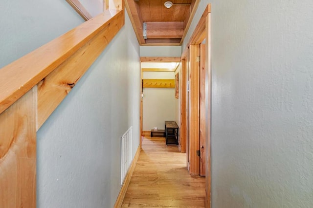 hallway featuring wood ceiling and light hardwood / wood-style flooring