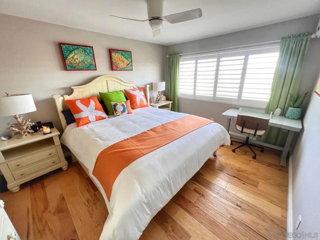 bedroom featuring ceiling fan and light wood-type flooring