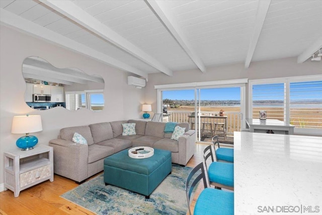 living room with light hardwood / wood-style floors, a wall unit AC, wooden ceiling, and beamed ceiling