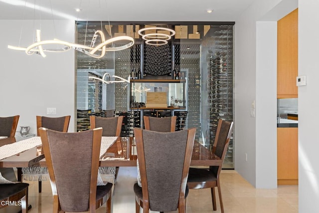 wine cellar featuring a notable chandelier