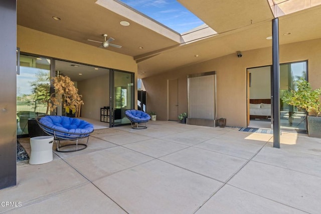 view of patio featuring ceiling fan and outdoor lounge area