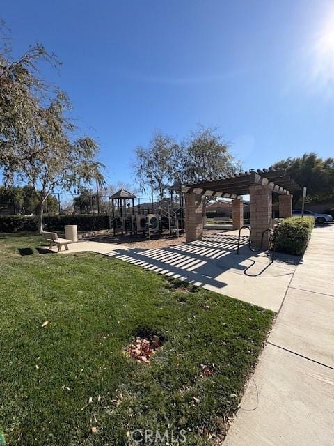 view of yard featuring a patio and a pergola