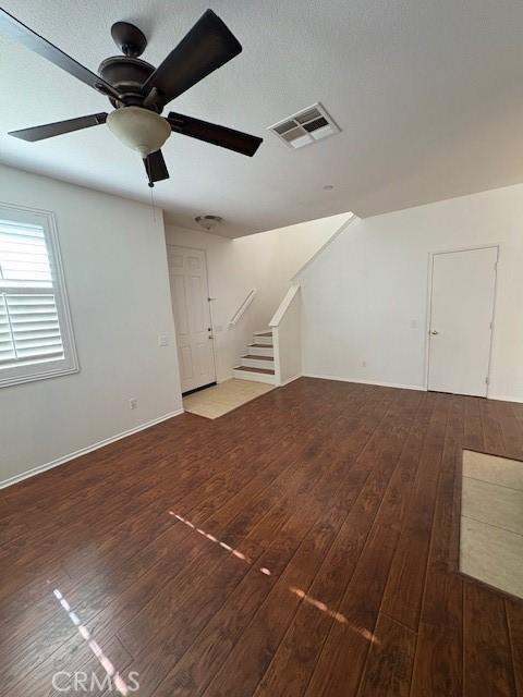 bonus room featuring wood-type flooring and ceiling fan